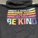 In A World Where You Can Be Anything BE KIND Vintage Teacher Pullover Hoodie, S