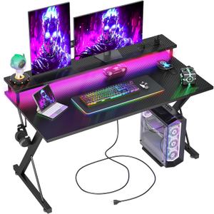 TIQLAB Gaming Desk with Power Outlets & LED 47 Inch Ergonomic Computer Carbon Fiber Surface Gamer Desk, Large Monitor Stand, Headphone Hook, PC Workstation for Bedroom, Black