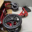 Medline Ultra Lightweight Transport Wheelchair for Adults, Foldable, 19-Inch Seat Width, Red Frame, Black Upholstery