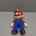 Super Mario It's-A Me, Mario! Collectible Action Figure, Talking Posable Mario Figure, 30+ Phrases and Game Sounds  12 Inches Tall!