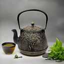 Toptier Mini Little Teapot, Super Small Cast Iron Teapot for Stove Top, Palm-Sized Japanese Stovetop Safe Tea Kettle with Infuser for 11 oz, Black