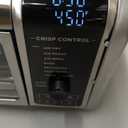 Ninja Digital Air Fry Countertop Oven, 8-in-1 Functionality, 1800W, Flip-Up Design, XL Capacity, Air Fry Basket, Wire Rack & Crumb Tray, Silver, SP101