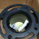Oatey 4 in. Cast Iron Twist-N-Set closet flange
