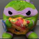 Snackles 35 cm Plush Teenage Mutant Ninja Turtles Edition by ZURU, Cuddly Squishy Comfort Plush with Teenage Mutant Ninja Turtles theme and Pizza Snack Accessory (Donatello)