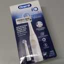 Oral-B Rechargeable Electric Toothbrush, iO2 Starter Kit, 3 Cleaning Modes, Automatic Pressure Sensor to Protect Gums, 2 Brush Heads, Pure White 