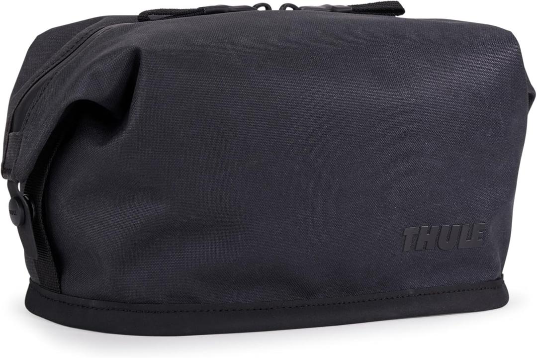 Thule Aion Toiletry Bag - Water-resistant bag for toiletries, makeup & shaving essentials - Removable liquids bag included - Easy to clean - Snap loop for easy hang - Waxed, PFC-free fabric (One Size, Black)