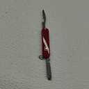 Victorinox Rally Swiss Army Knife, Compact, 9 Functions, Swiss Made Pocket Knife with Magnetic Phillips Screwdriver, Bottle Opener and Key Ring - Red