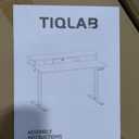 TIQLAB Standing Desk with Two Drawers, Stand Up Standing Desk Adjustable Height, Electric Sit Stand Table with Storage Shelf and Splice Board, 48 * 24 inch, Maple