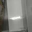 Steel grille for a bath hood