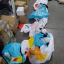 nflatable arch with snowman soldiers on both ends and a polar bear, blue snowflake, and cute Santa penguin in the middle of the archway