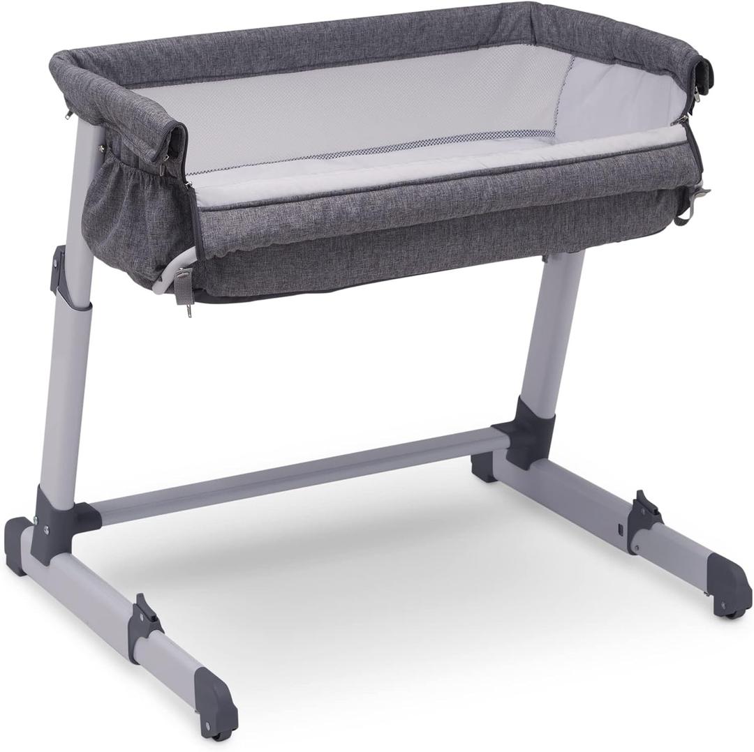 Delta Children Simmons Kids Dream Bedside Bassinet with Zip-Down Side Wall – Convenient Baby Sleeper with Breathable Mesh and Adjustable Heights - Lightweight Portable Crib, Grey, Specialty Size